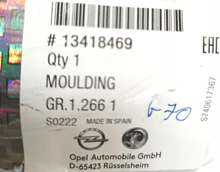 Opel Meriva B przed liftingiem- emblemat chrom atrapy_13418469